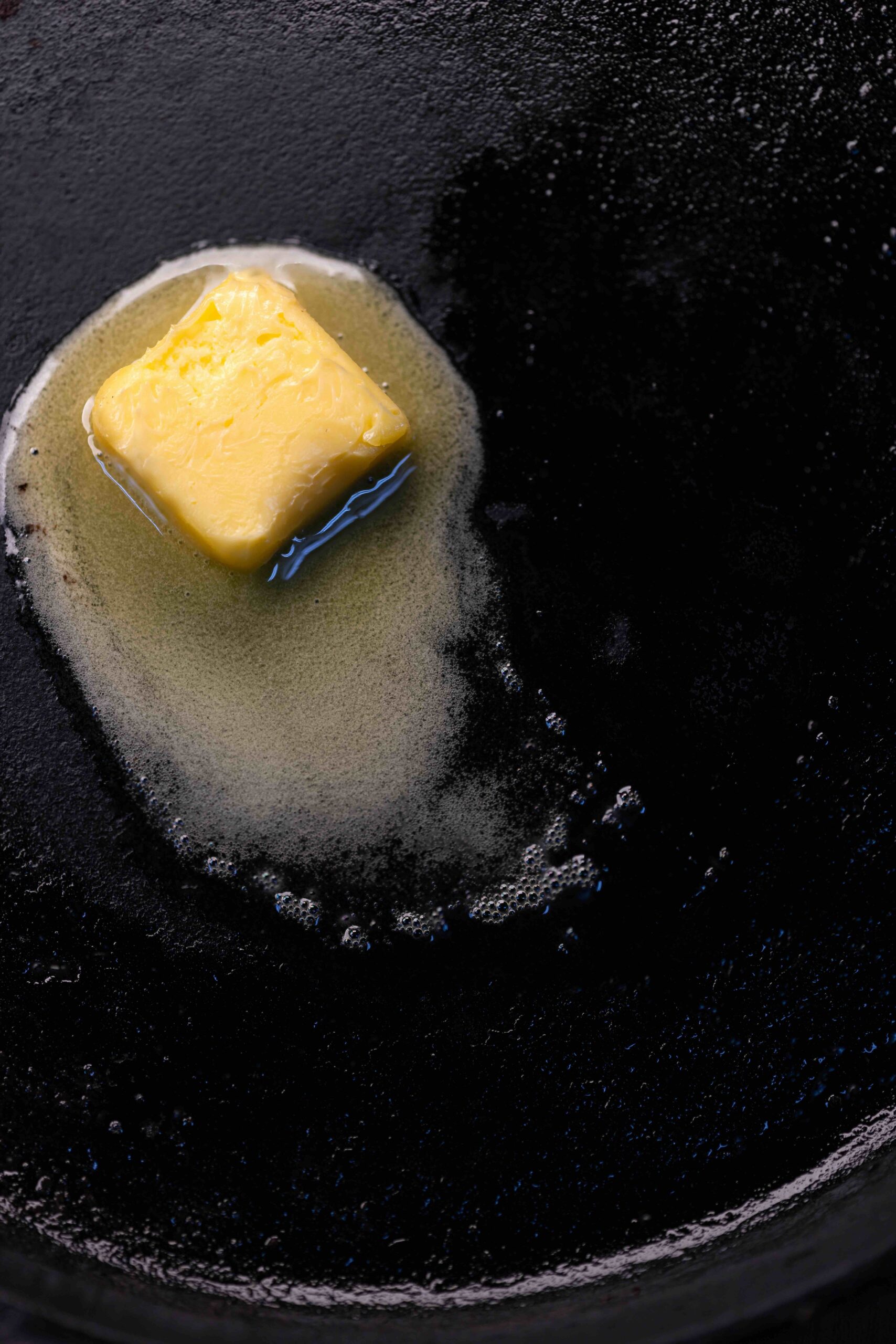 Synthetic butter melting in a skillet. 